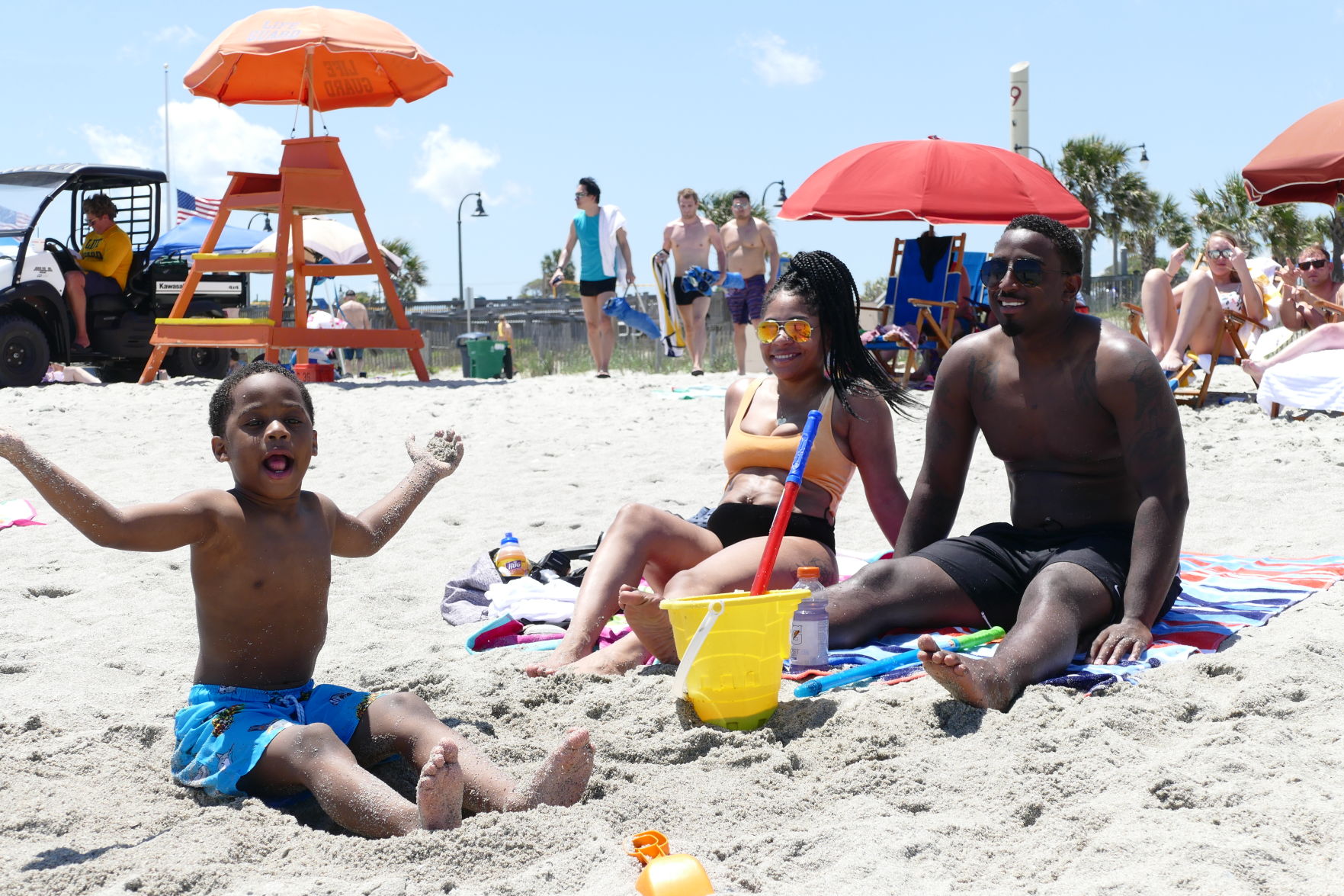 The Mitchells relax in the sand